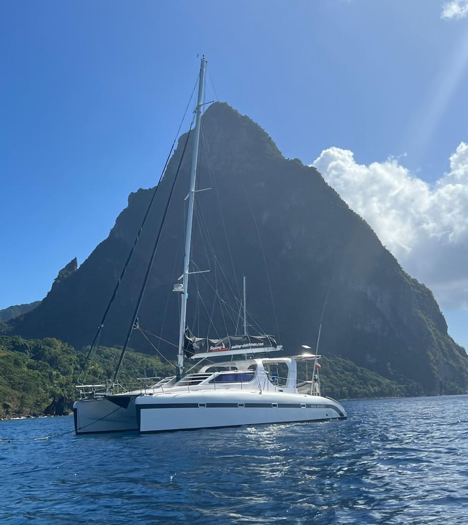 Sailing Dutchman catamaran AKUA AMINATA anchored near Pitons St Lucia